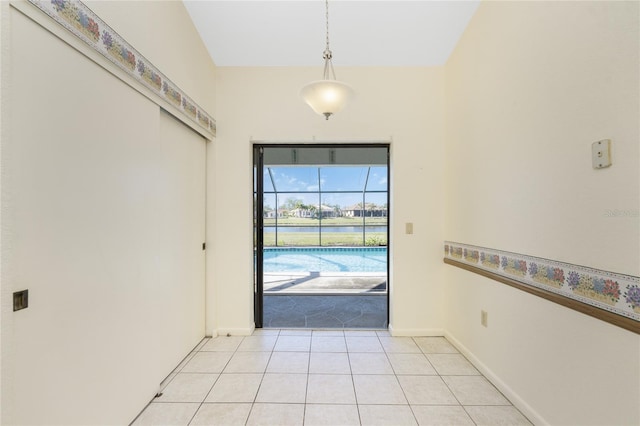 entryway with light tile patterned floors