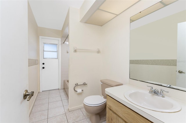 full bathroom with tile patterned flooring, vanity, toilet, and tiled shower / bath combo