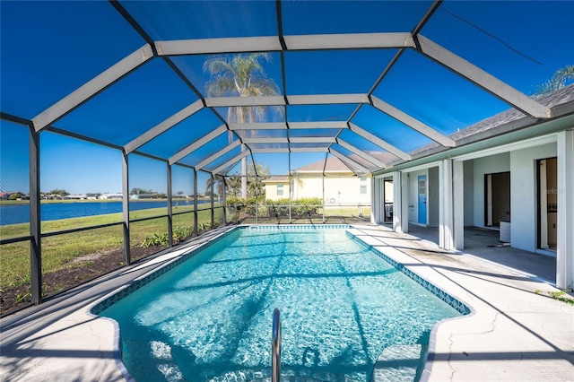 view of pool featuring a lanai, a patio area, and a water view