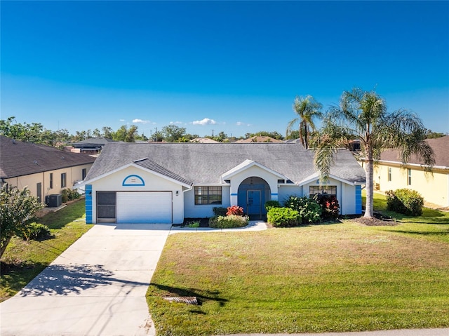 single story home with central AC unit, a front yard, and a garage