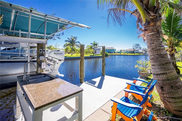 dock area featuring a water view