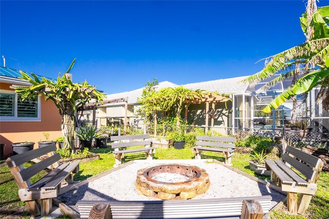 view of patio with an outdoor fire pit