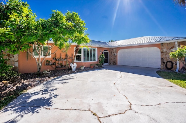 view of front of property featuring a garage