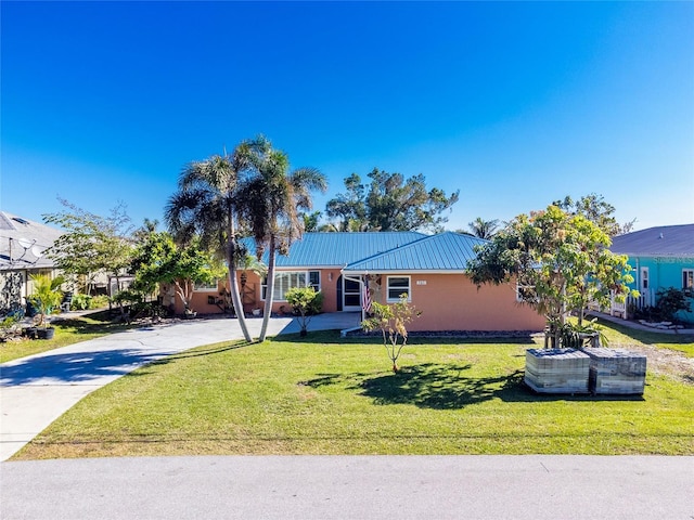 single story home with a front yard