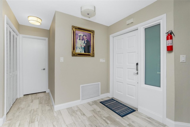 entryway with light wood-type flooring