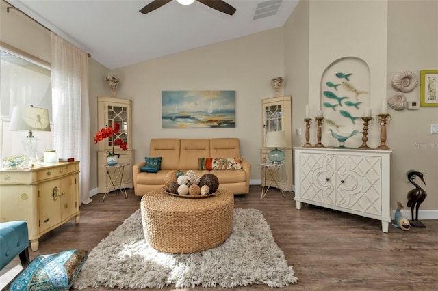 sitting room with vaulted ceiling, ceiling fan, and dark hardwood / wood-style floors