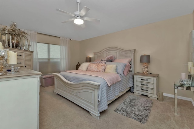 bedroom with light colored carpet and ceiling fan