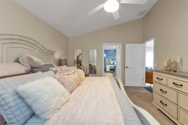 carpeted bedroom featuring ceiling fan and lofted ceiling