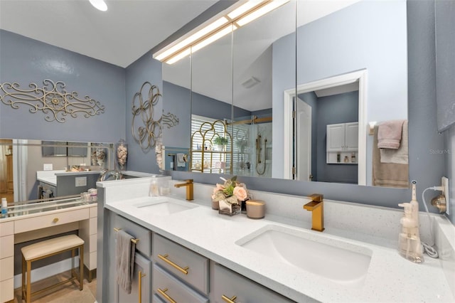 bathroom featuring vanity and a shower with shower door