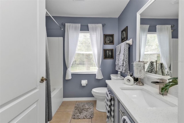 full bathroom featuring tile patterned flooring, vanity, shower / washtub combination, and a healthy amount of sunlight