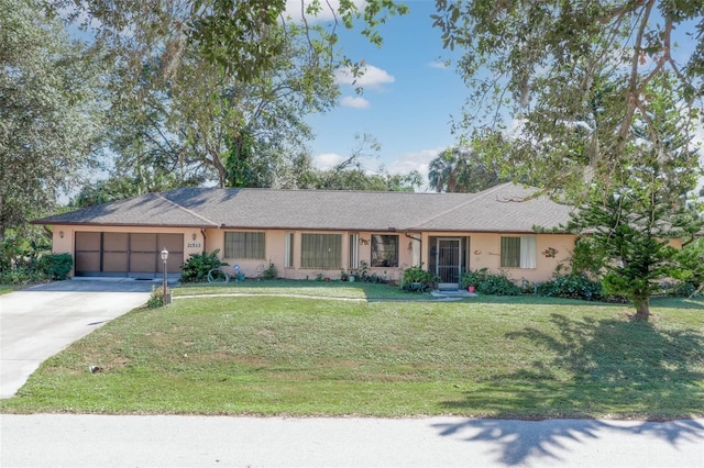 ranch-style house with a front yard and a garage