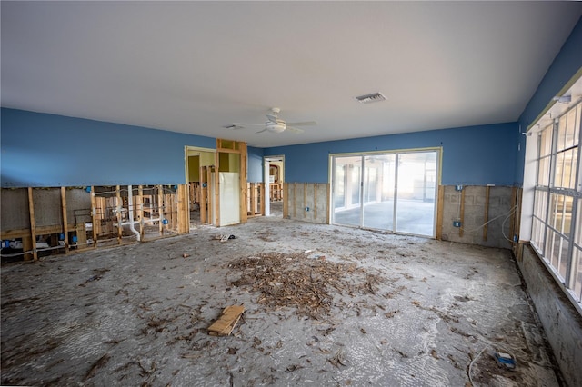 interior space featuring ceiling fan