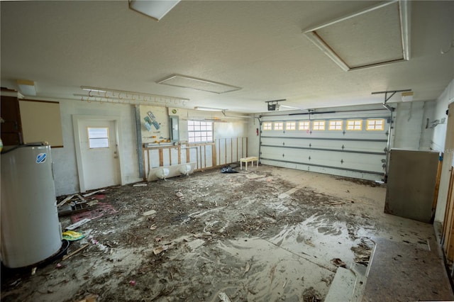 garage with a garage door opener, electric panel, and water heater