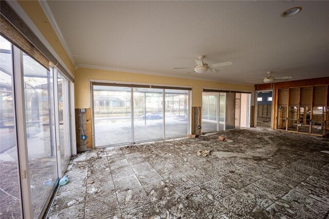 interior space featuring crown molding and ceiling fan