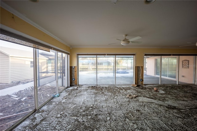 unfurnished room featuring crown molding, ceiling fan, and a healthy amount of sunlight