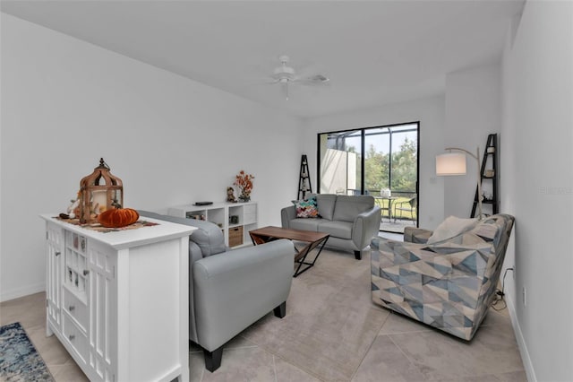 tiled living room featuring ceiling fan