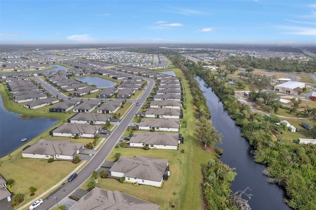 aerial view featuring a water view