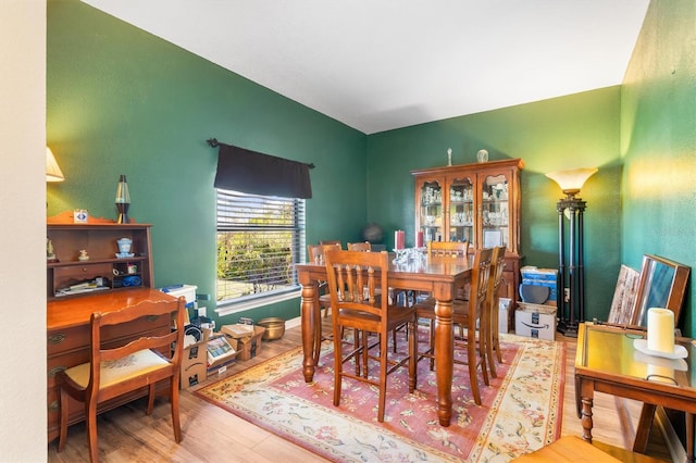 dining area featuring hardwood / wood-style floors