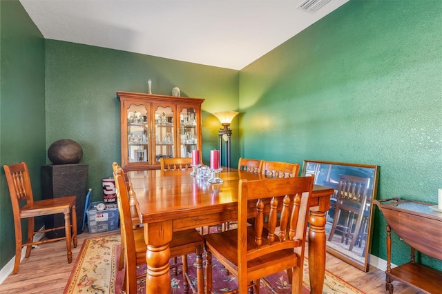 dining area featuring light hardwood / wood-style floors