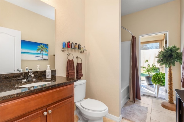 full bathroom with toilet, shower / bath combo, vanity, and tile patterned floors