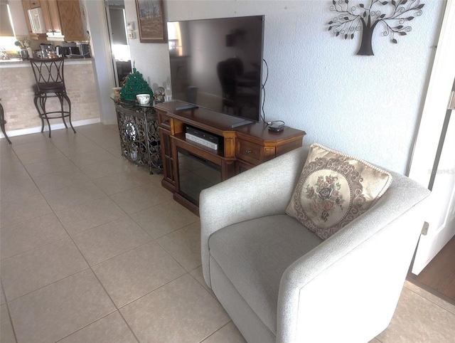 living room with light tile patterned floors