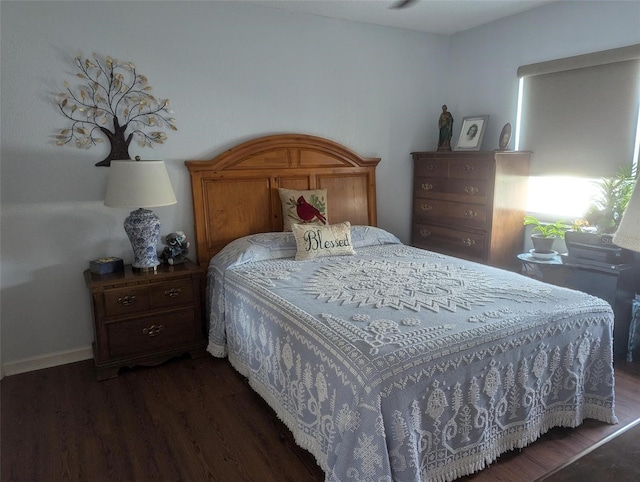 bedroom featuring dark hardwood / wood-style floors