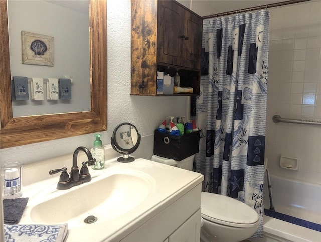 full bathroom with vanity, toilet, and shower / bath combo