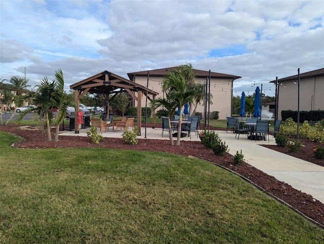 view of home's community featuring a gazebo, a yard, and a patio