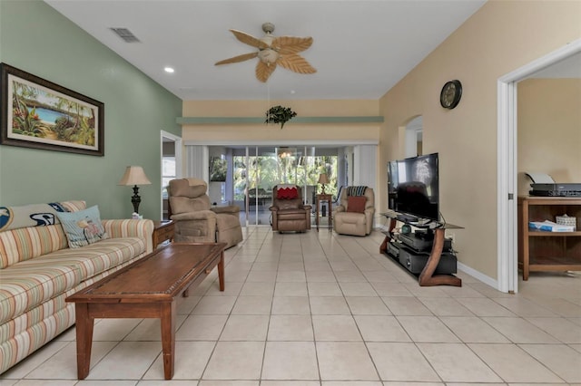 living room featuring ceiling fan and light tile patterned flooring