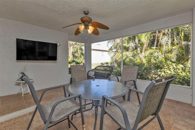 view of patio featuring ceiling fan