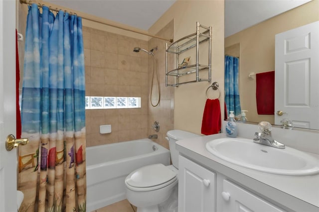 full bathroom featuring toilet, vanity, and shower / tub combo with curtain