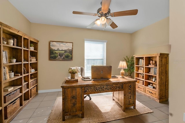 office featuring ceiling fan and light tile patterned floors