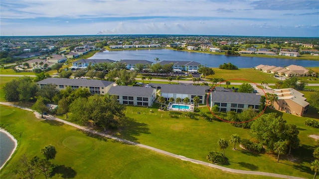 birds eye view of property featuring a residential view and a water view