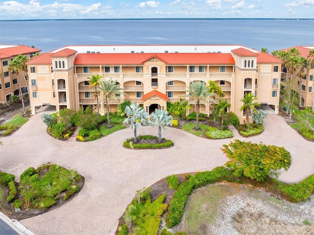 view of property with a water view