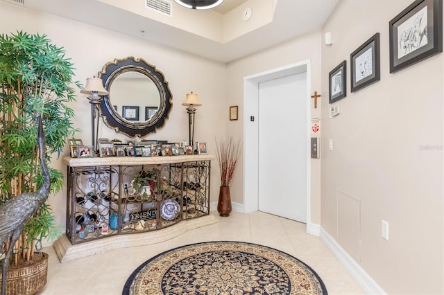 view of tiled foyer entrance