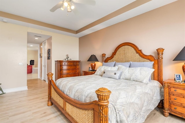 bedroom with ceiling fan and light hardwood / wood-style flooring