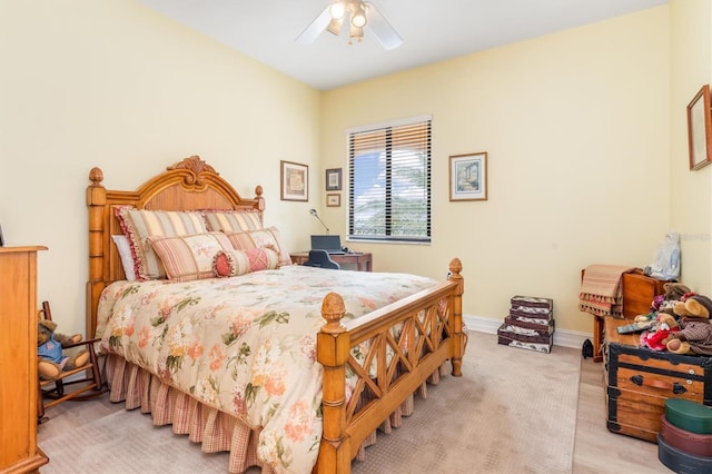 bedroom featuring light hardwood / wood-style floors and ceiling fan