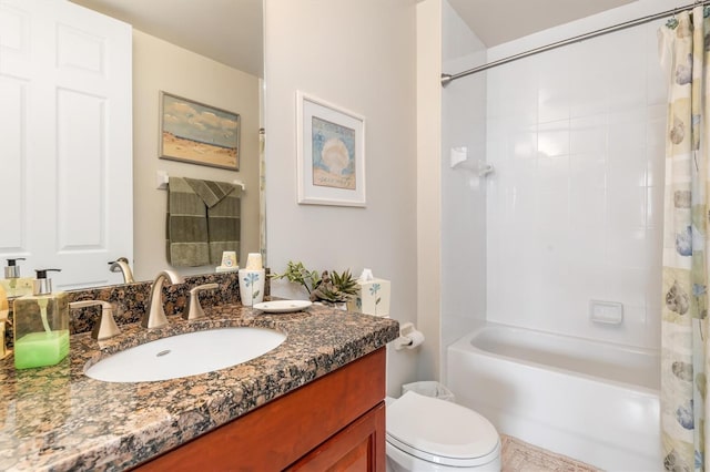 full bathroom with vanity, shower / bathtub combination with curtain, and toilet