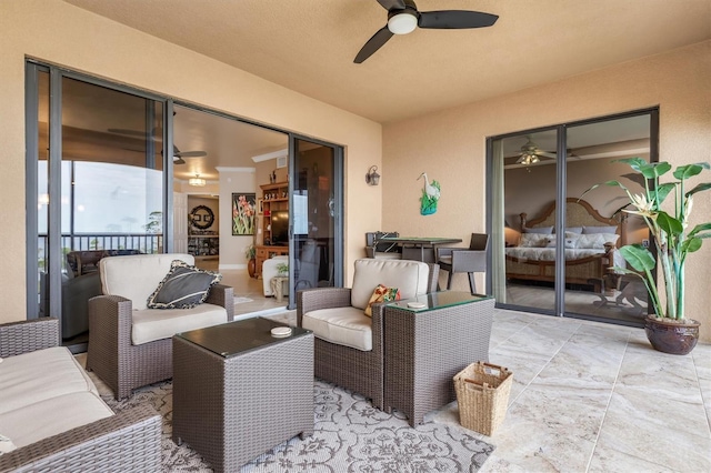 view of patio with an outdoor hangout area and ceiling fan