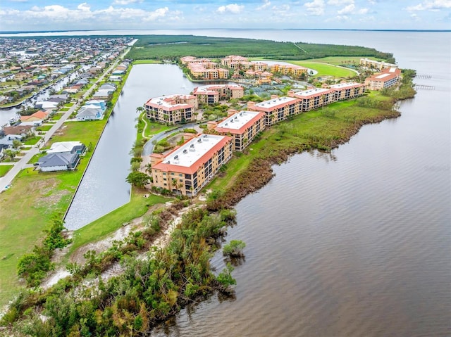 drone / aerial view with a water view