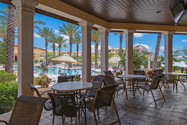 view of patio / terrace featuring a community pool