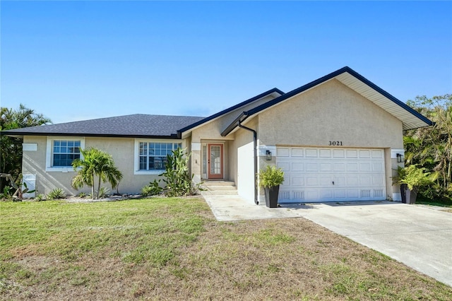 ranch-style house with a front yard and a garage