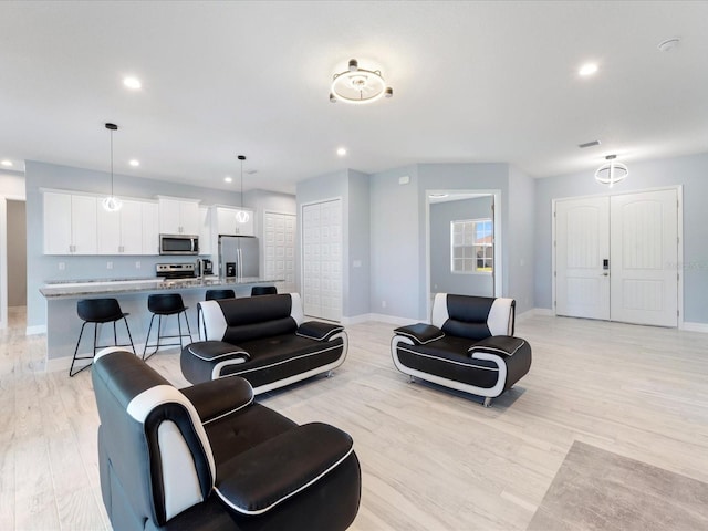 living room featuring light hardwood / wood-style flooring