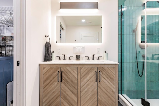 bathroom featuring vanity and walk in shower