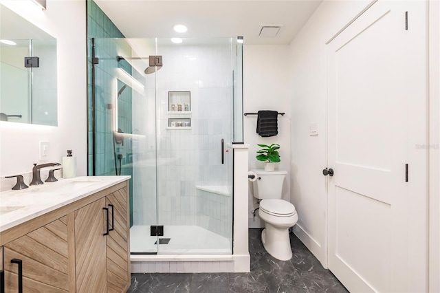 1010 Robinhood Dr, Punta Gorda, FL 33982 - full bathroom with toilet, vanity, a shower stall, marble finish floors, and recessed lighting