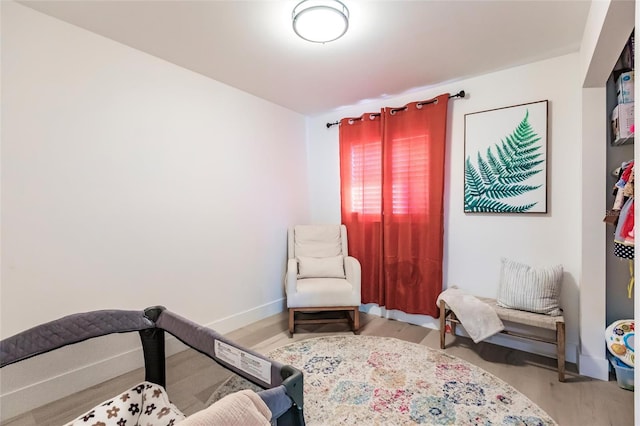 bedroom with light hardwood / wood-style floors