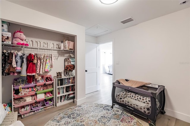 1010 Robinhood Dr, Punta Gorda, FL 33982 - bedroom featuring baseboards, a closet, and attic access