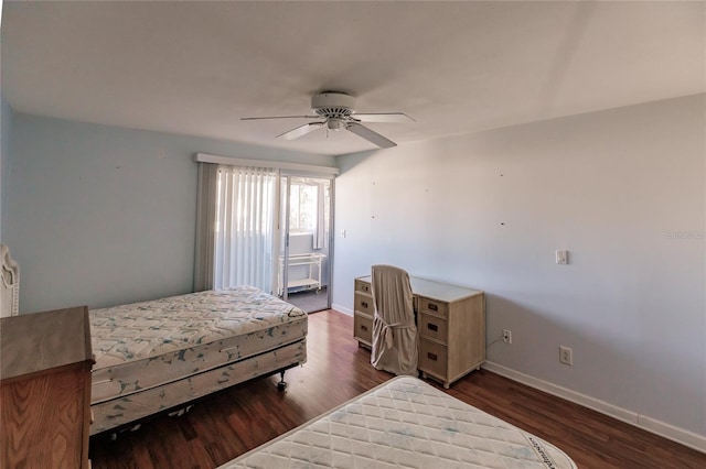 bedroom with ceiling fan and dark hardwood / wood-style flooring