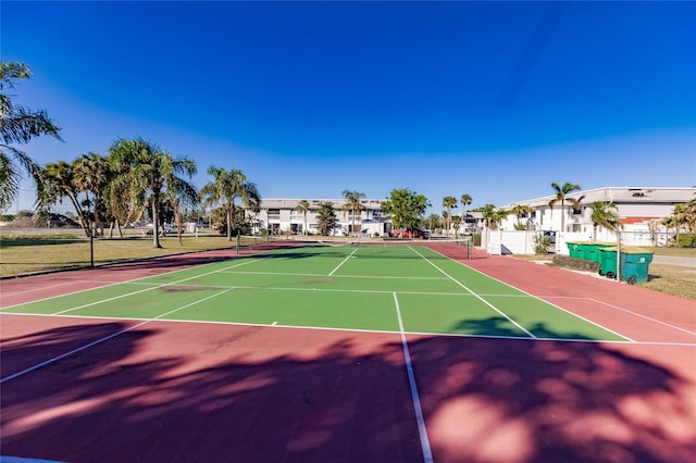 view of sport court with basketball hoop