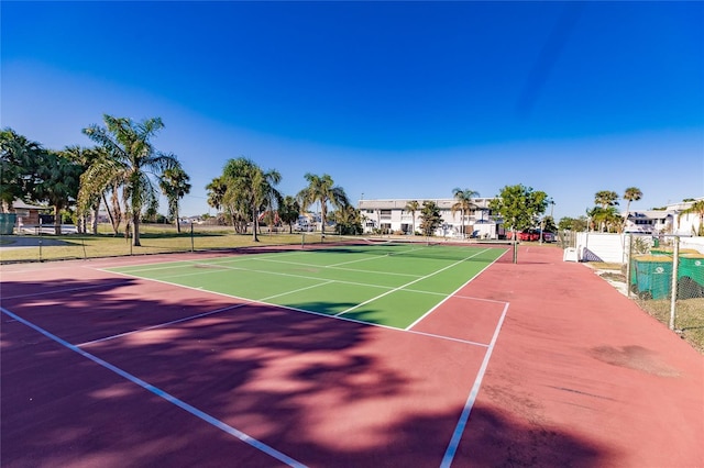 view of tennis court with basketball court